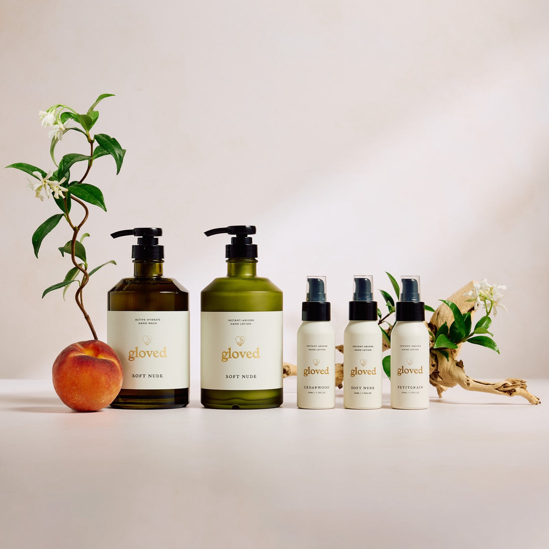 The Soft Nude Starter Set: hand wash, hand lotion and three mini lotions, photographed in the scent studio